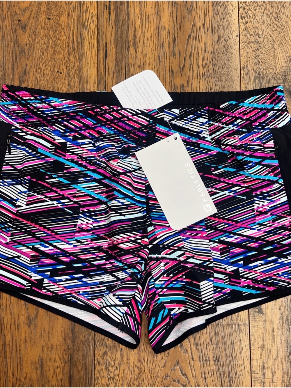 Fabletics Women’s Multicolor Geometric Bike Shorts - Pink, Blue, Black